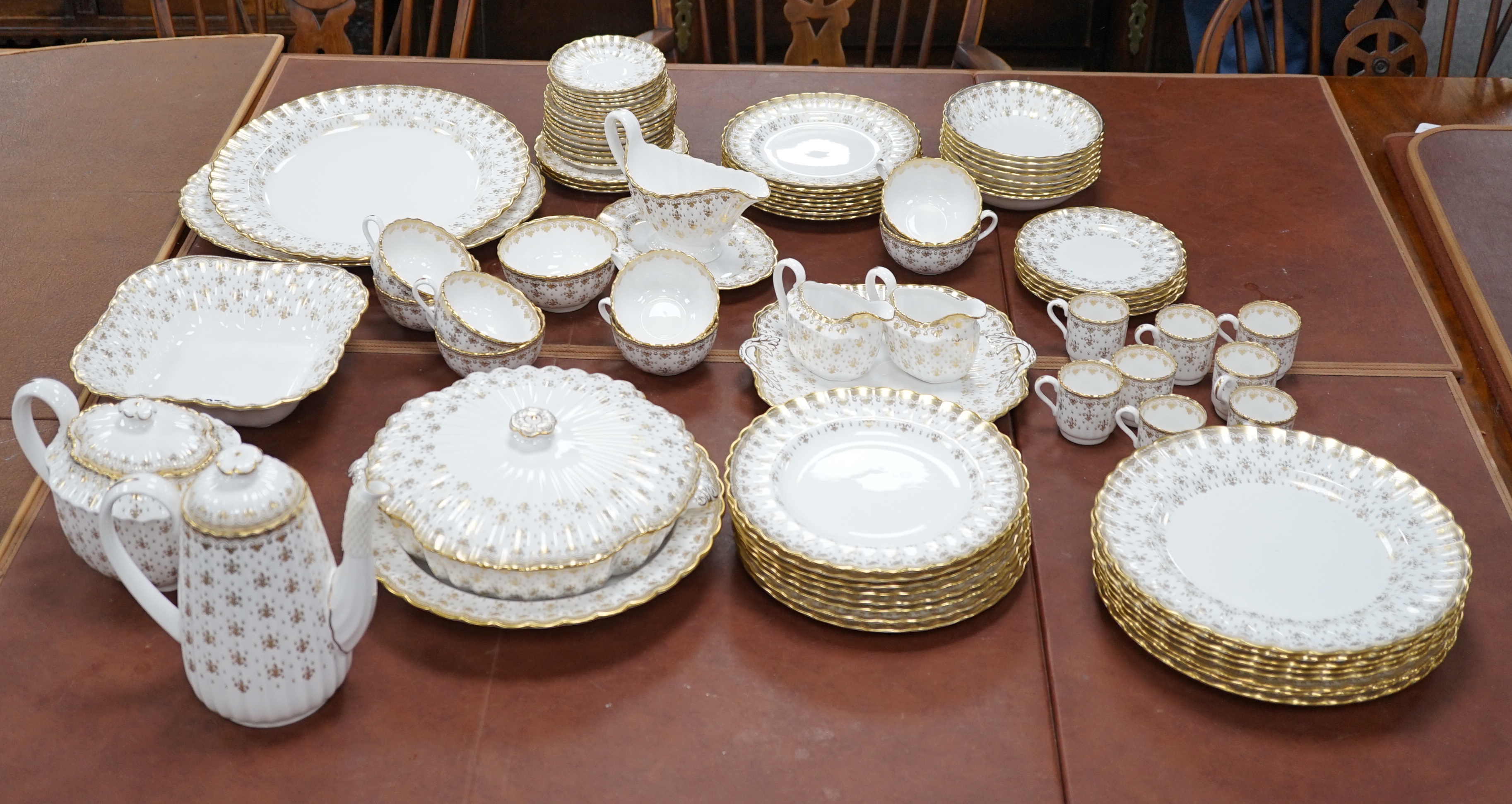 A Spode ‘Fleur de Lys’ dinner, tea and coffee set, settings for eight
